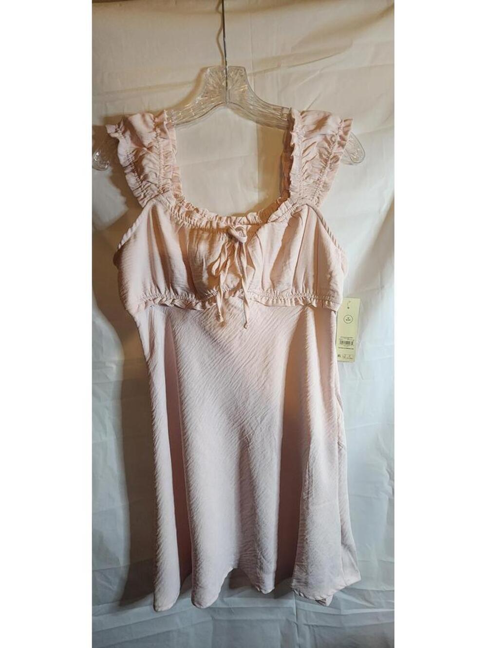 Light Pink Sleeveless Dress with Ruffle Straps and Bow Detail